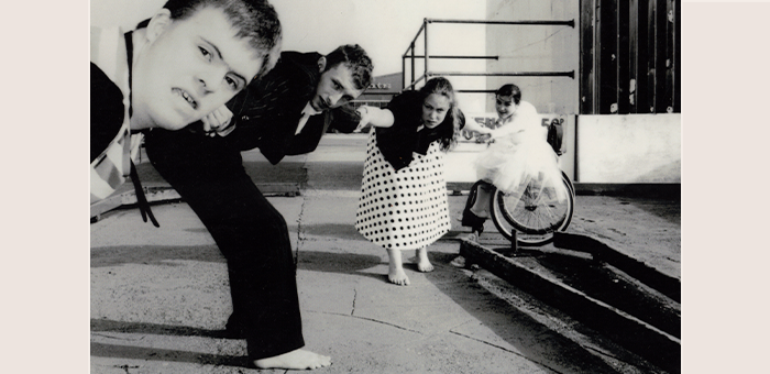 A black-and-white picture of a human chain.