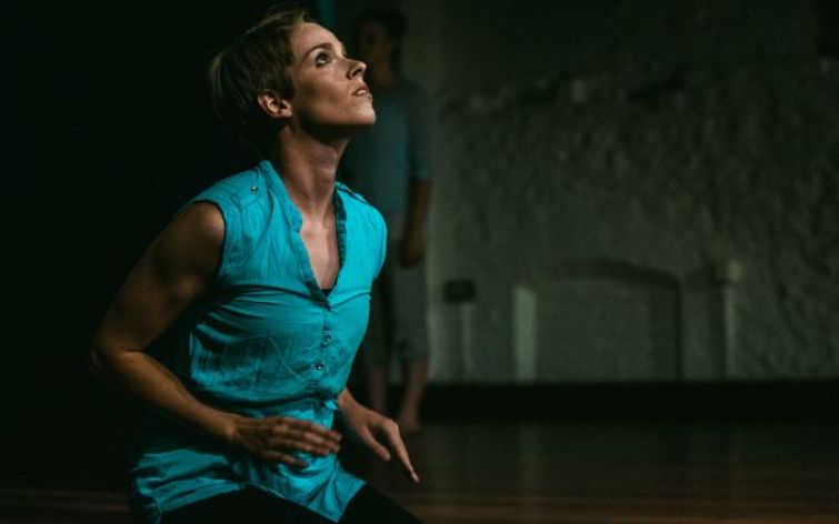 Photo of Kat in a turquoise top