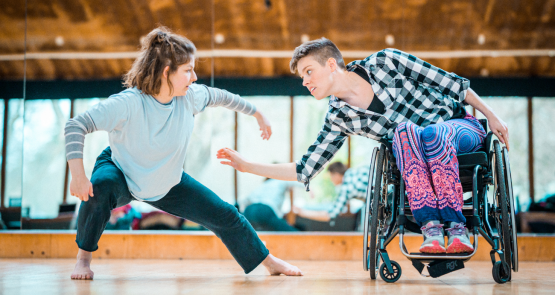 Abbie and Kat dancing in the studio.
