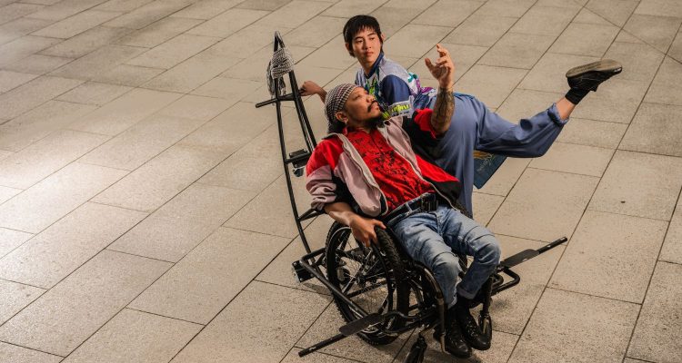 1 wheelchair dancer and 1 standing dancer